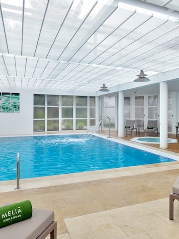 a swimming pool inside a room