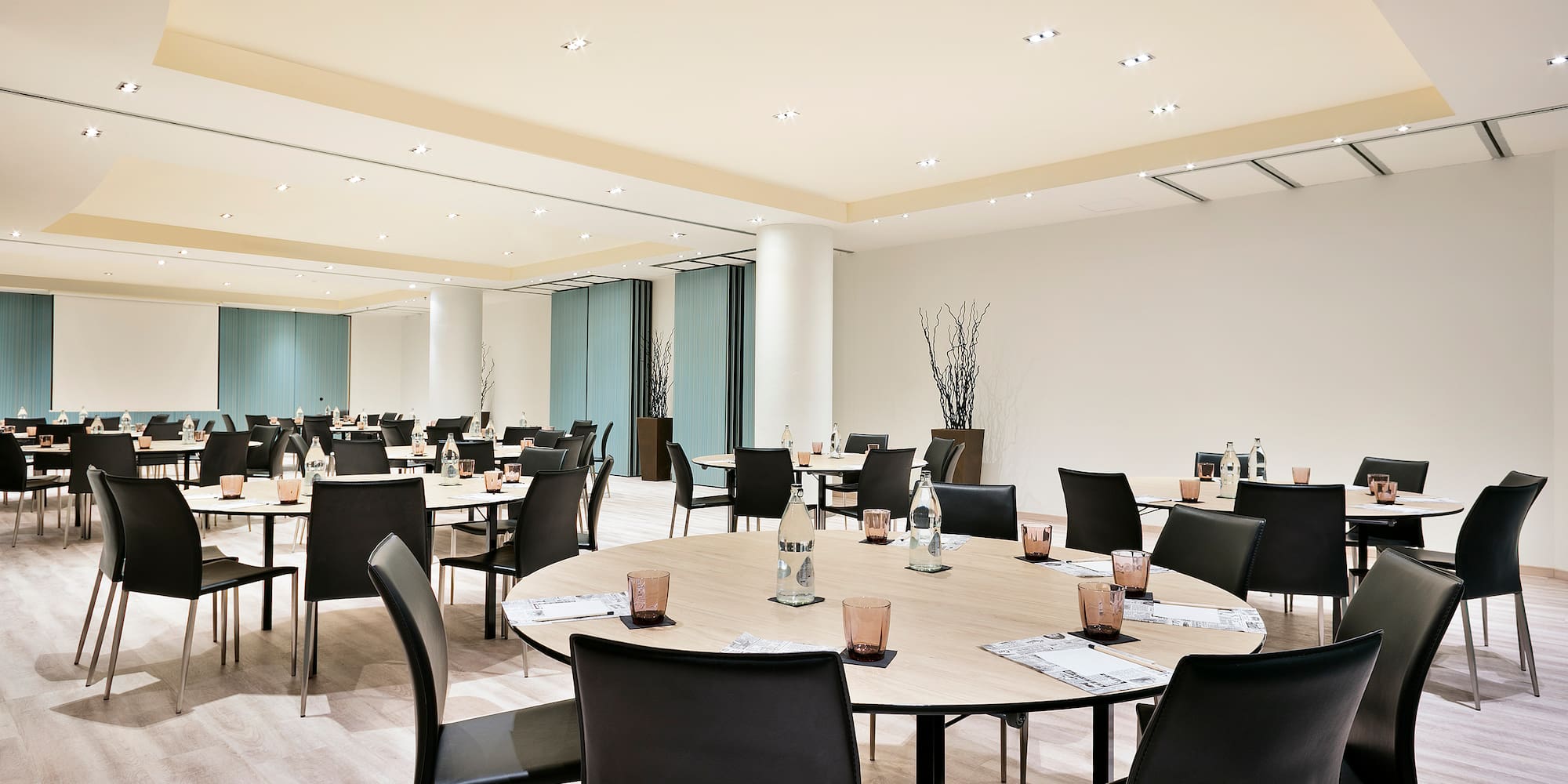 a room with tables and chairs