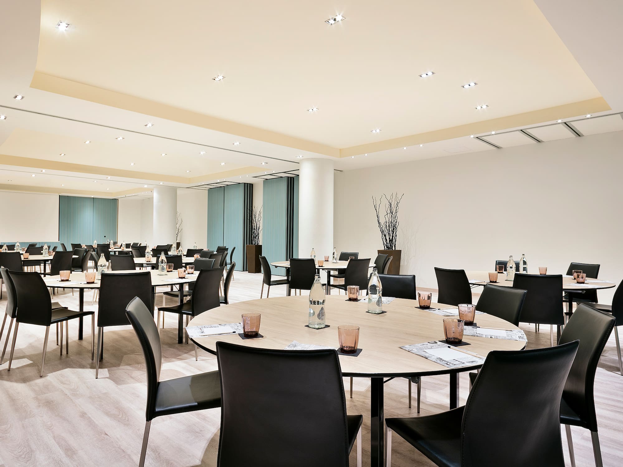 a room with tables and chairs