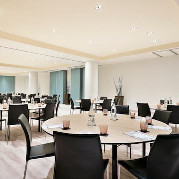 a room with tables and chairs