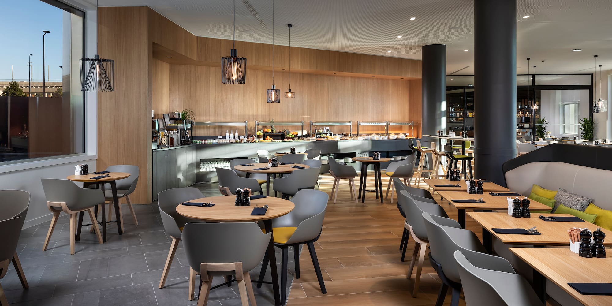 a restaurant with tables and chairs