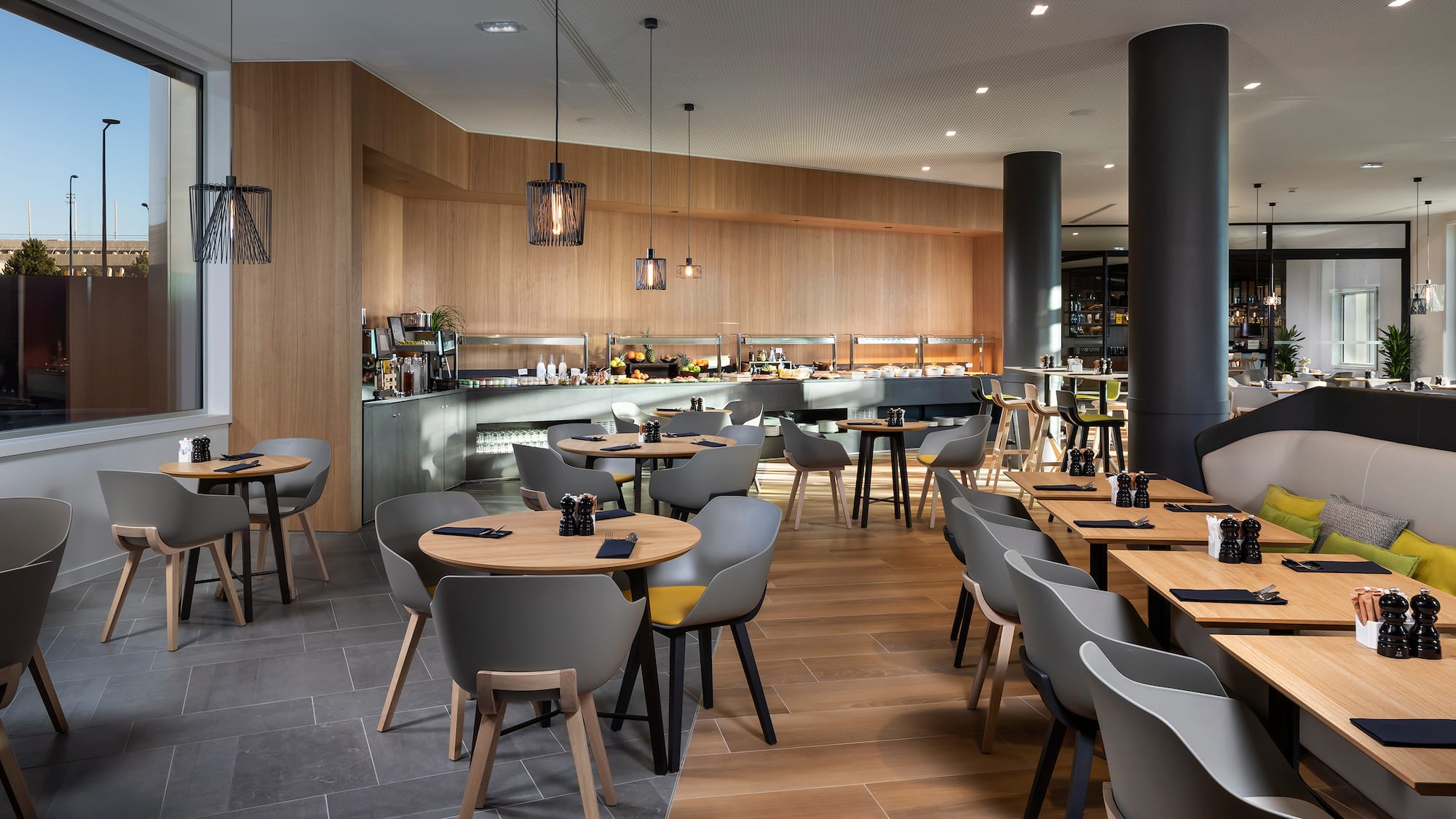 a restaurant with tables and chairs