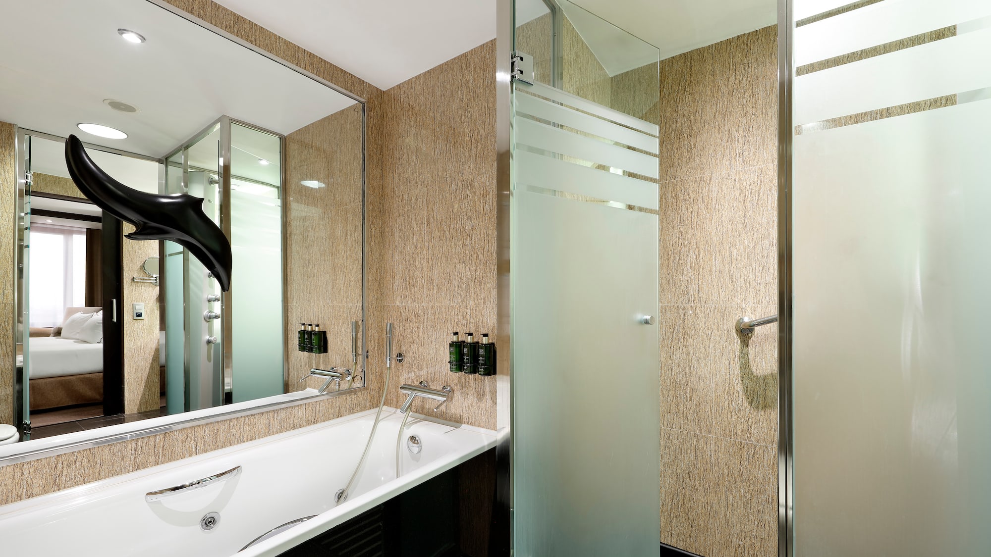 a bathroom with a bathtub and shower