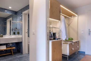 a bathroom with a sink and cabinets
