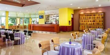 a room with tables and chairs