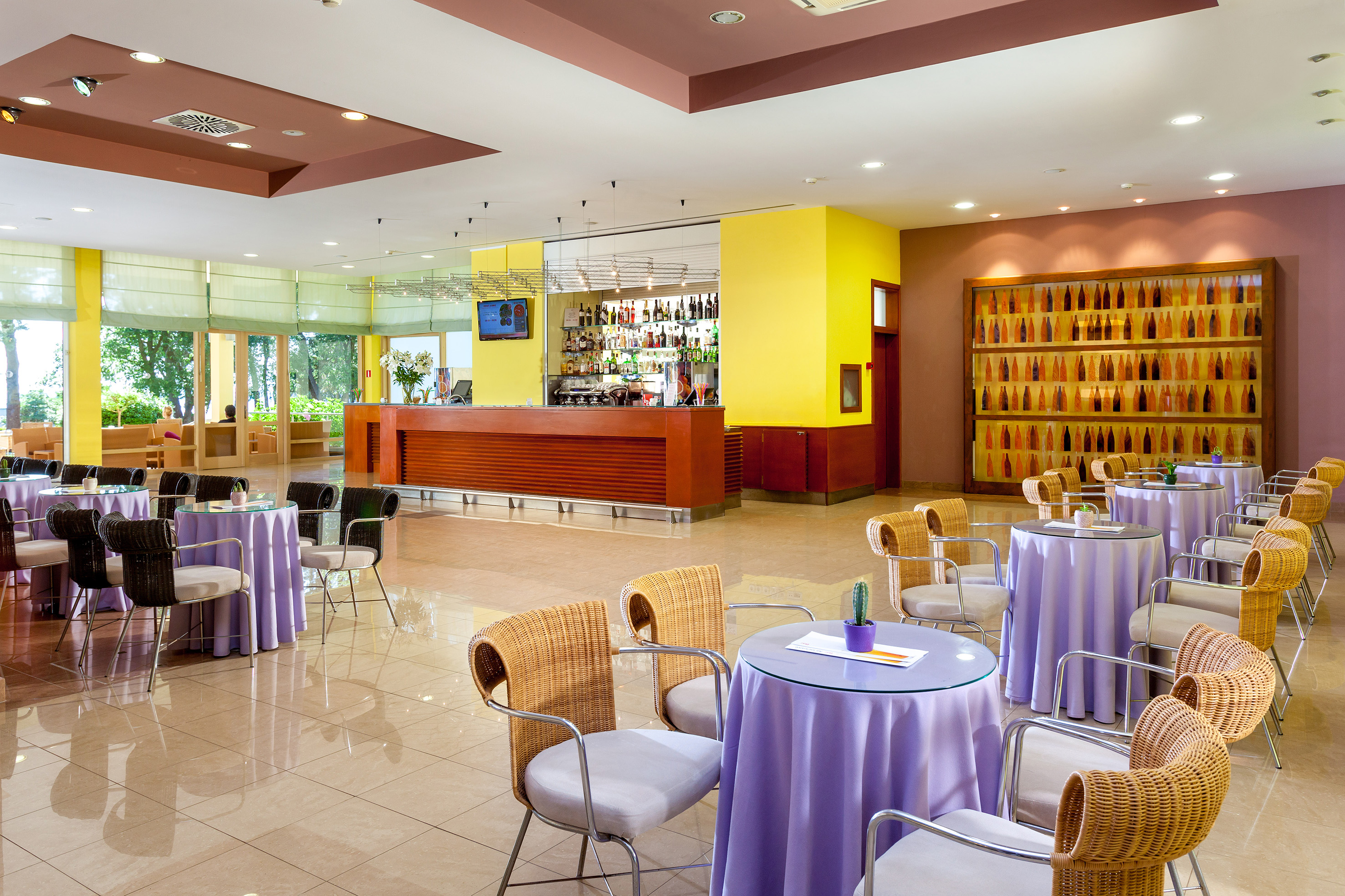 a room with tables and chairs