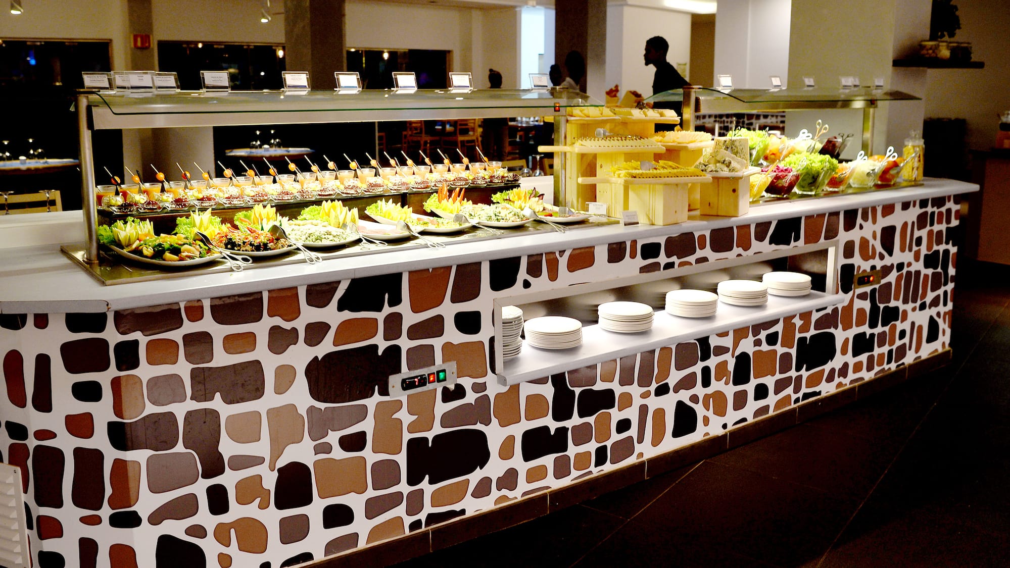 a buffet with plates of food