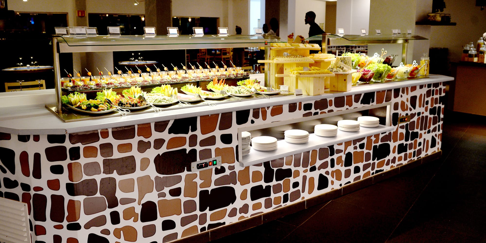 a buffet with plates of food