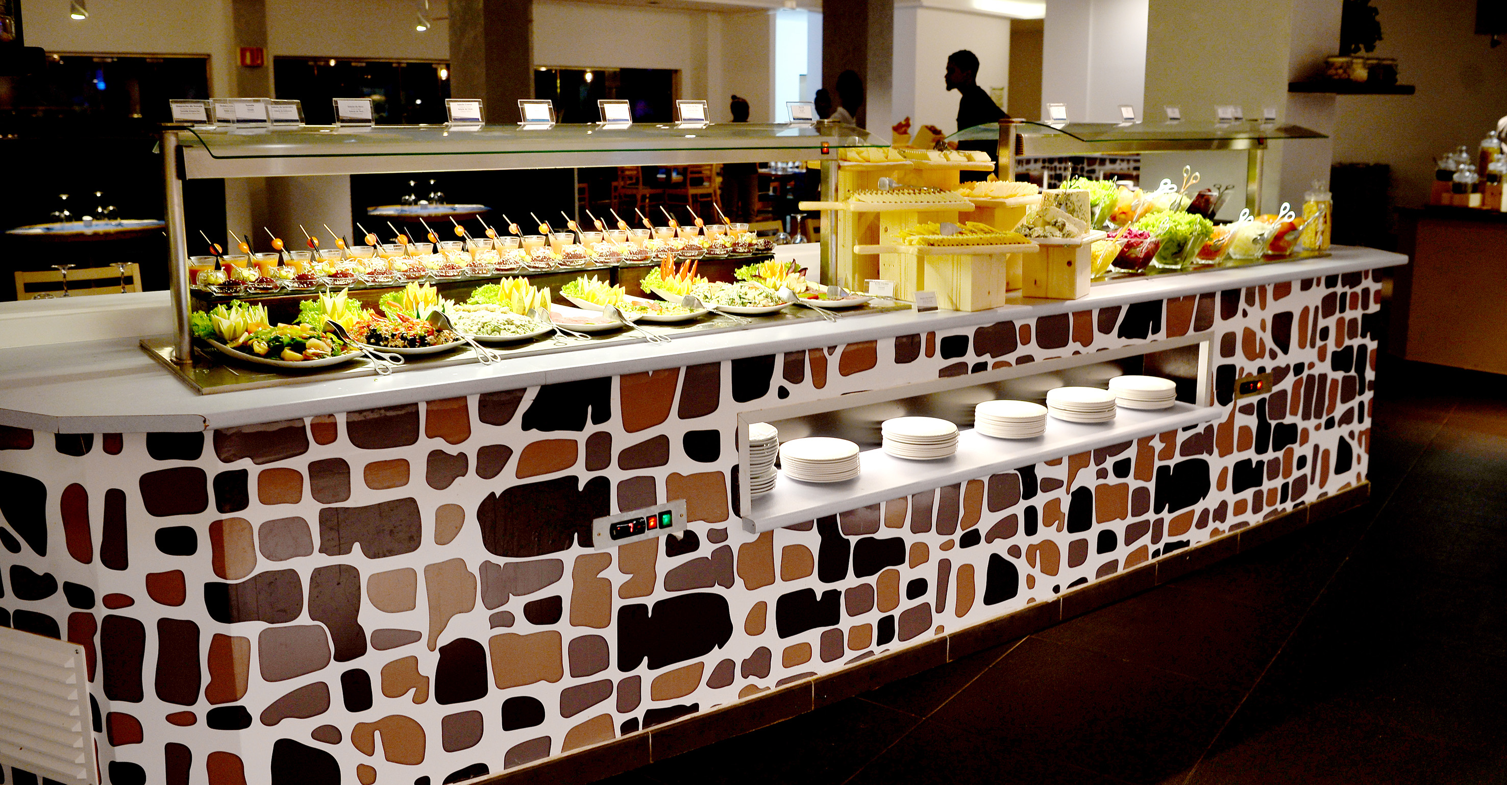 a buffet with plates of food