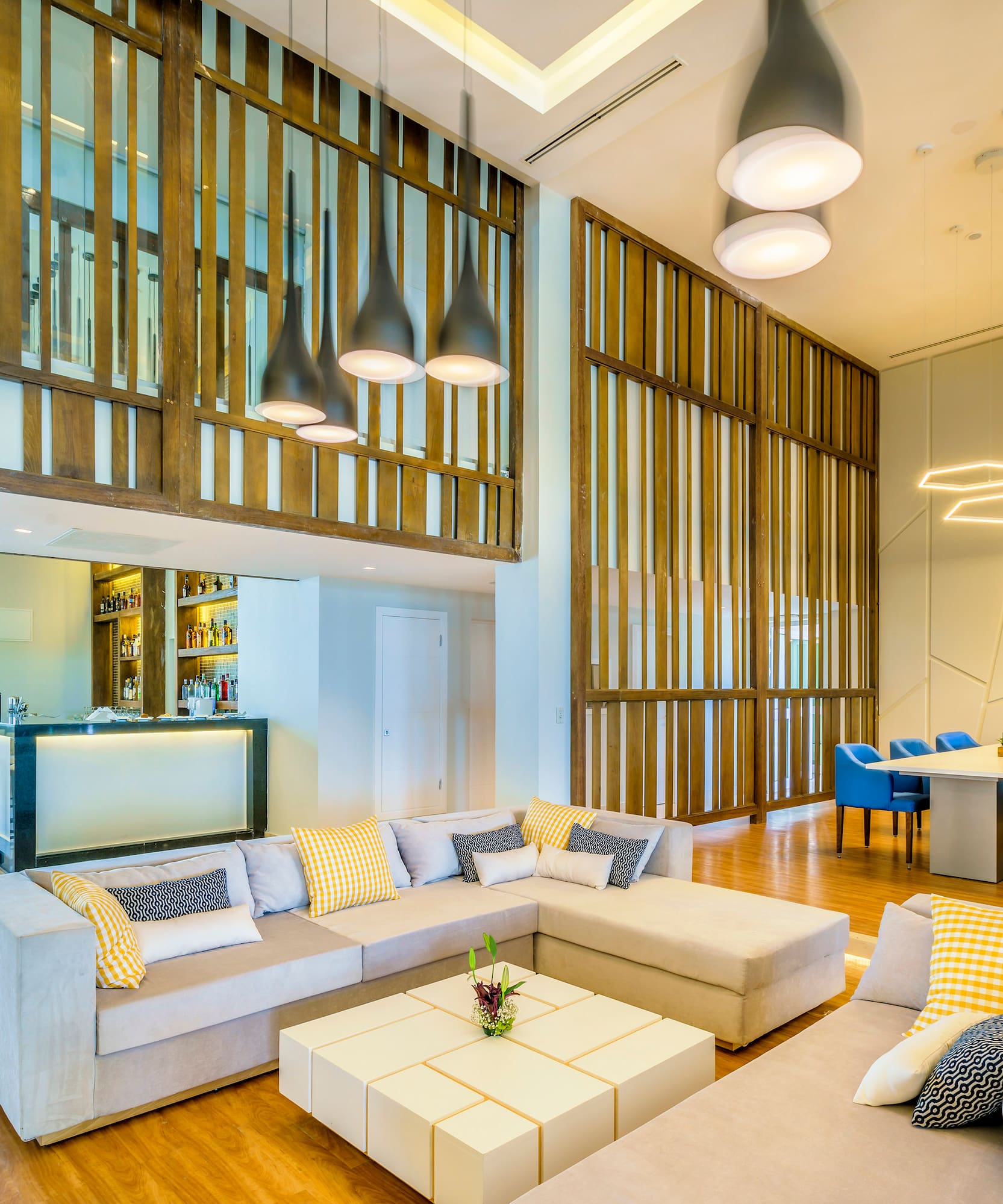 a living room with a large couch and a table