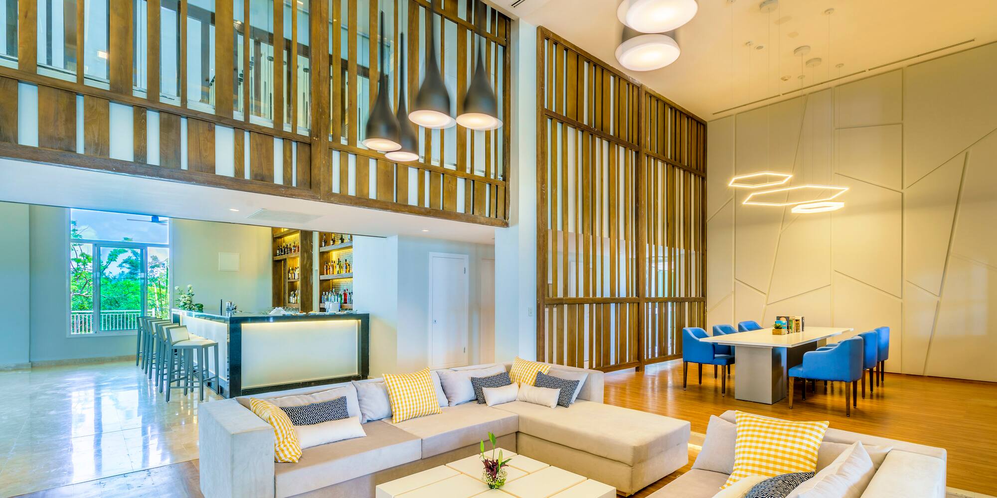 a living room with a large couch and a table