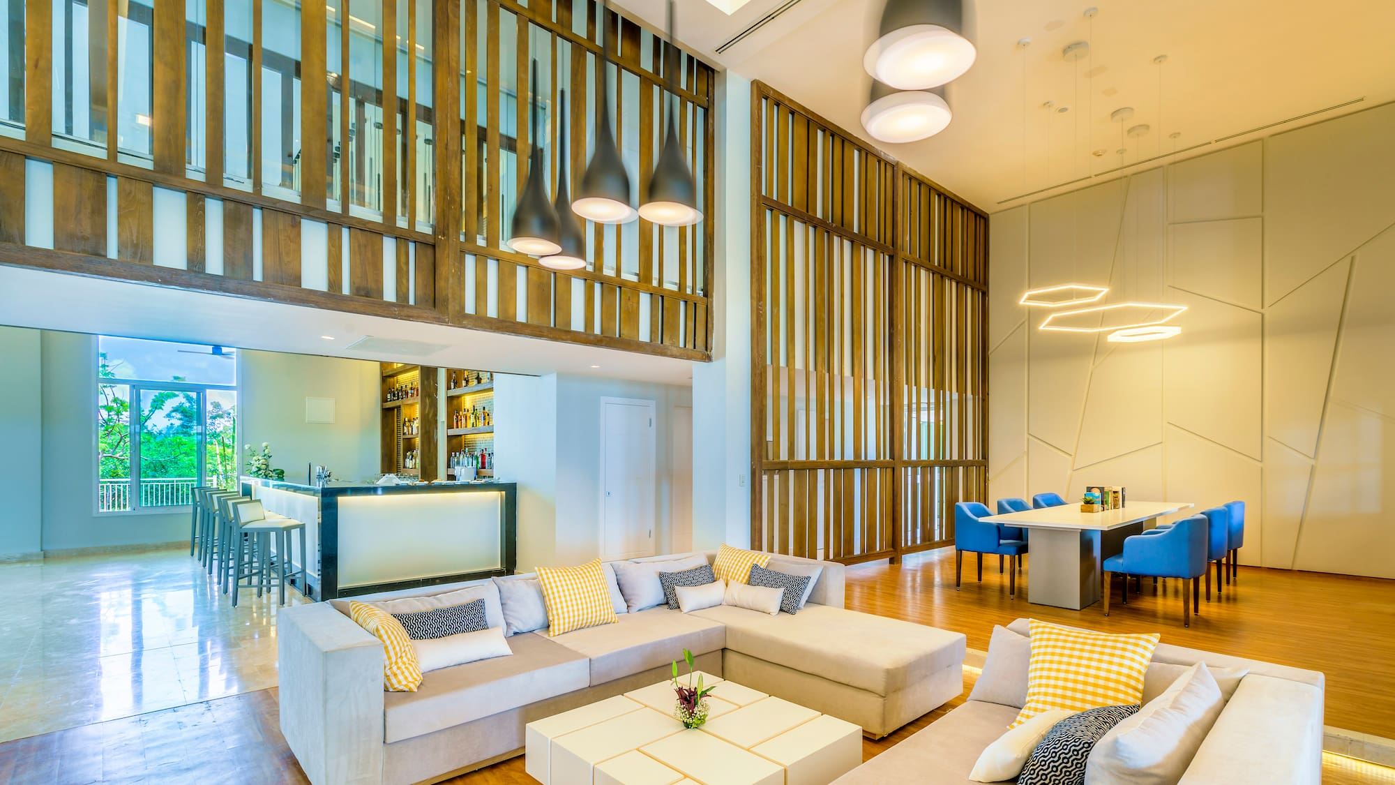 a living room with a large couch and a table