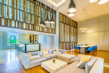 a living room with a large couch and a table