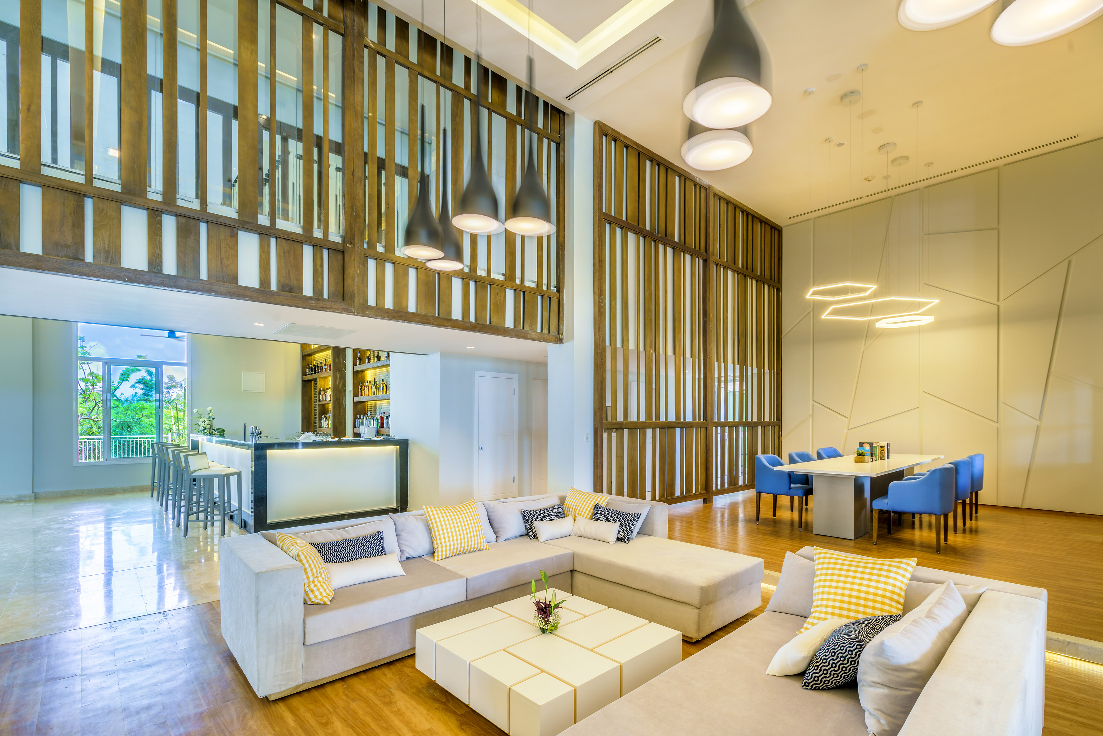 a living room with a large couch and a table