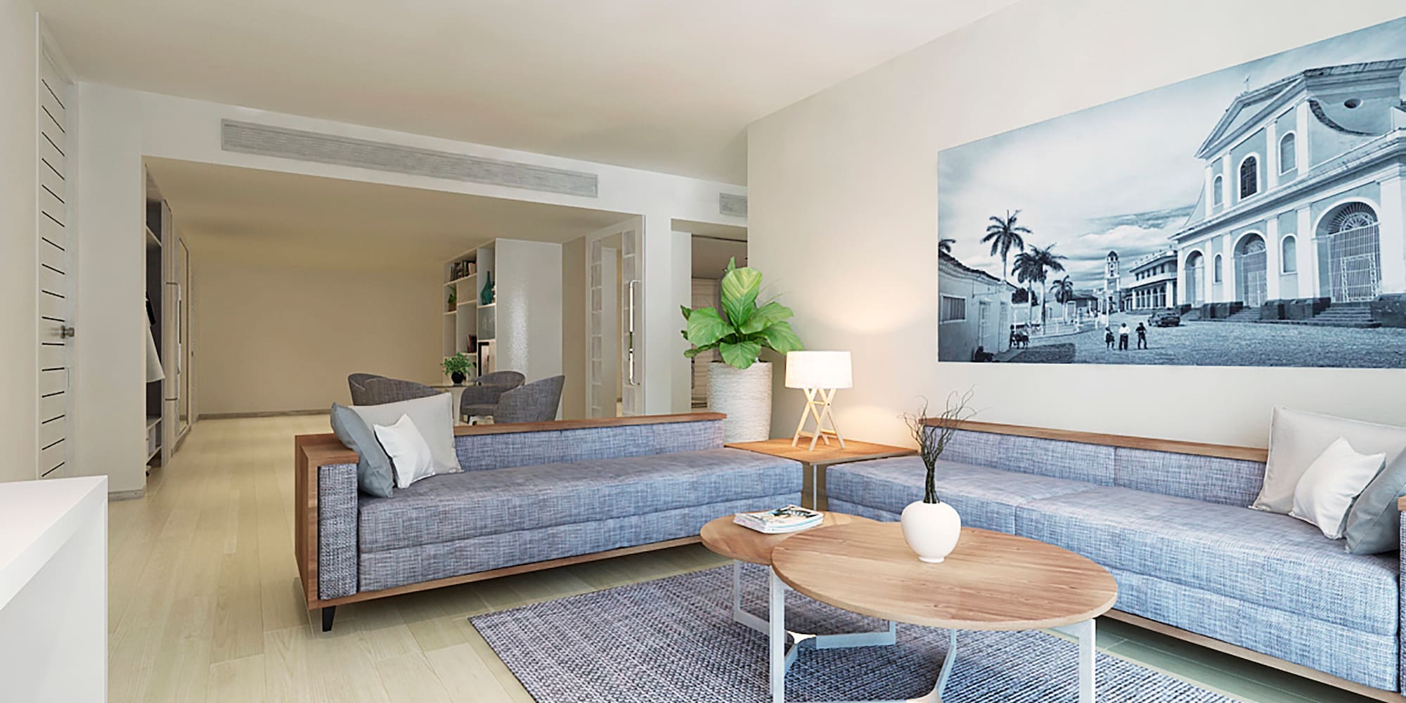 a living room with couches and a table