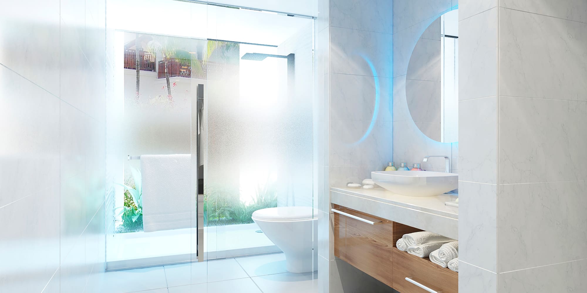 a bathroom with a glass shower door