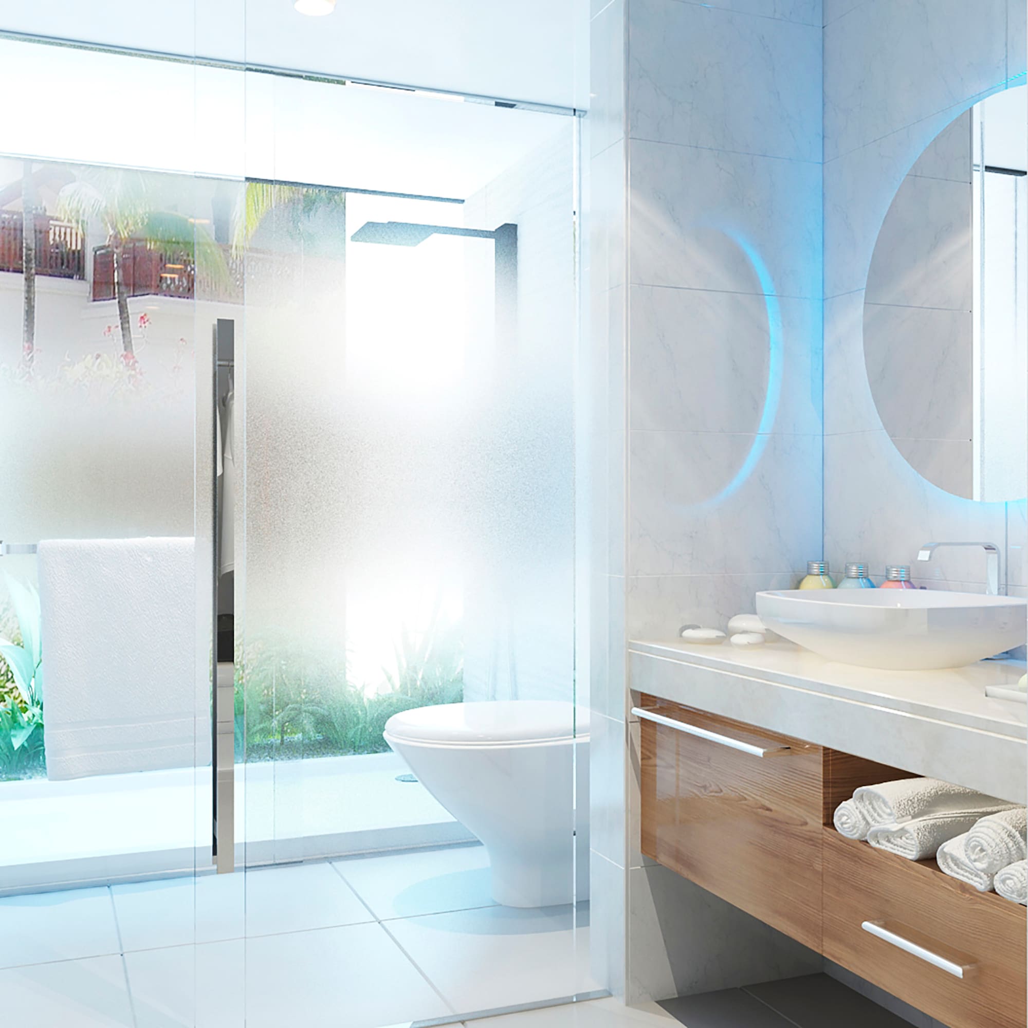 a bathroom with a glass shower door