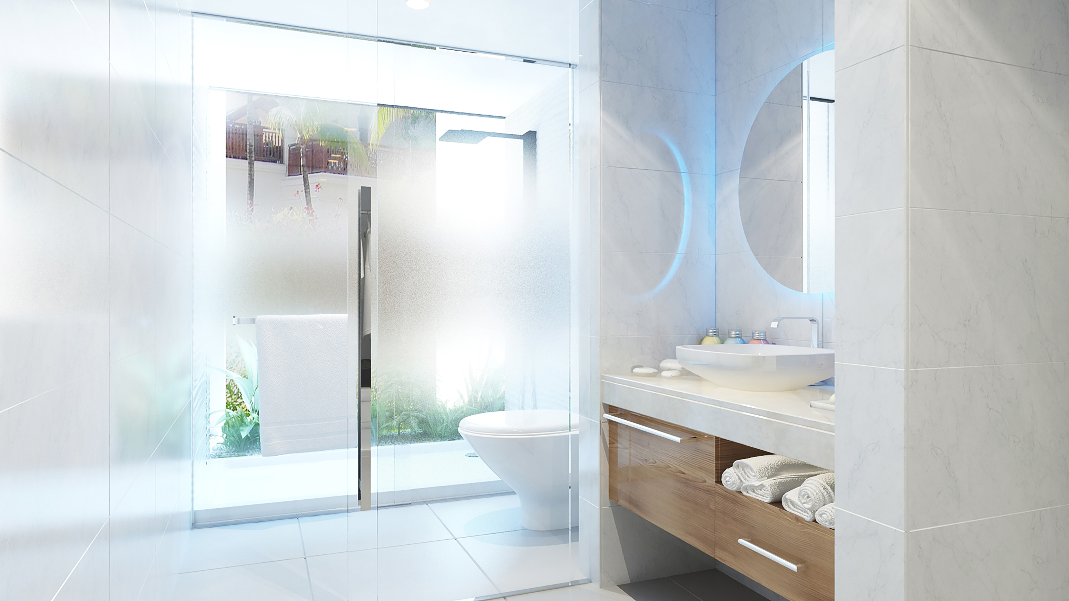 a bathroom with a glass shower door