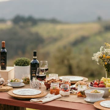 a table with food and wine on it