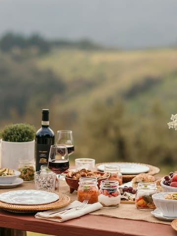 a table with food and wine on it