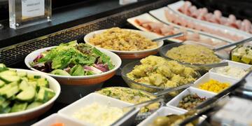 a buffet line of food