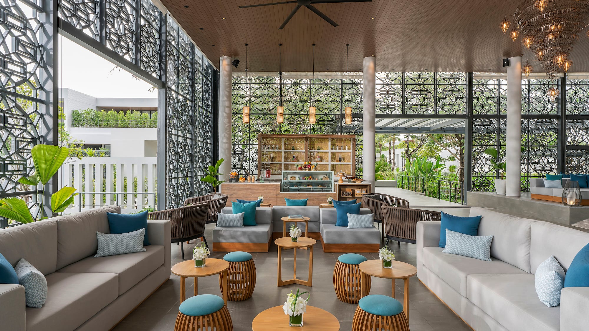 a room with a couch and tables