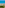 Blue ocean, sandy beach, wooden boardwalk across dunes, person walking.