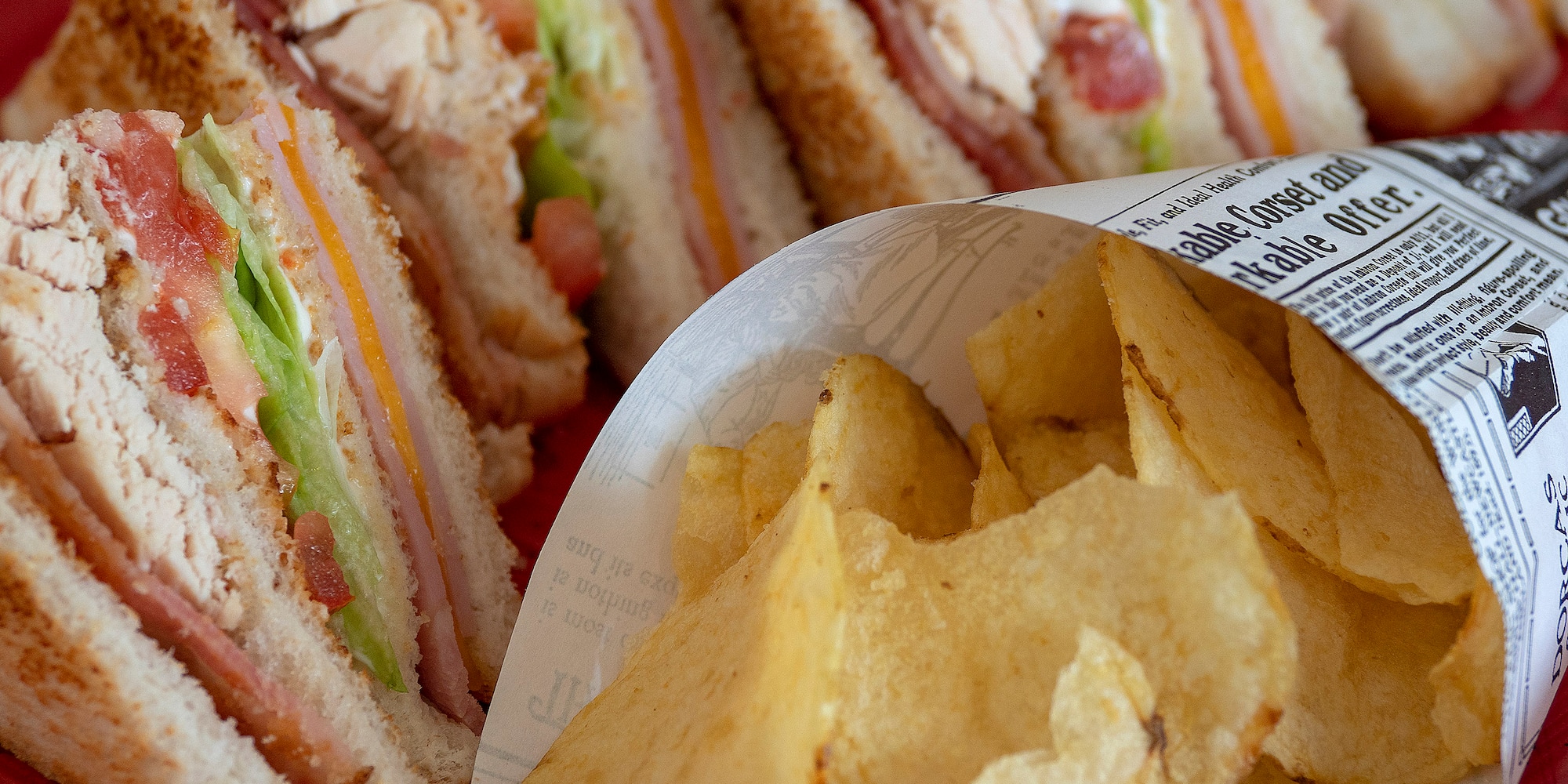 a sandwich and potato chips