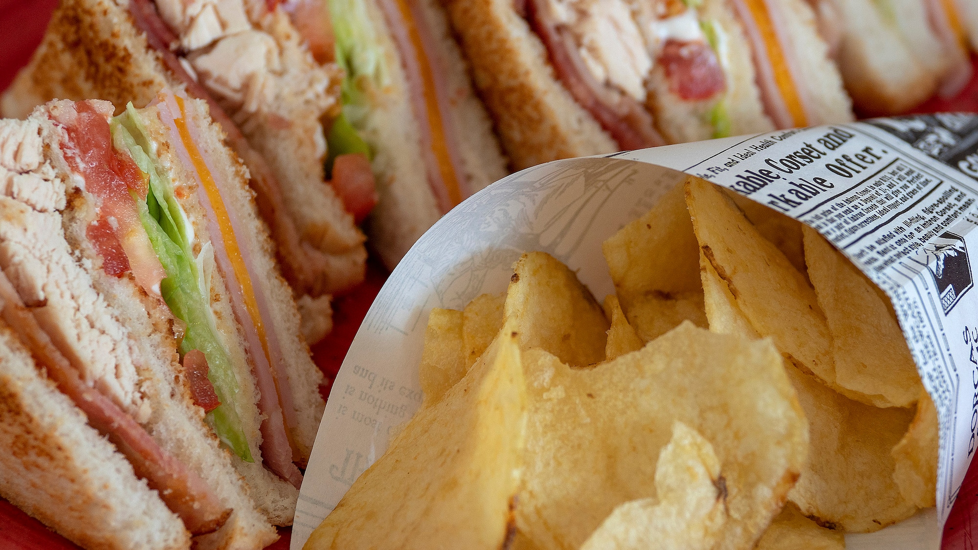 a sandwich and potato chips