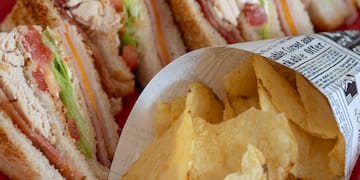 a sandwich and potato chips