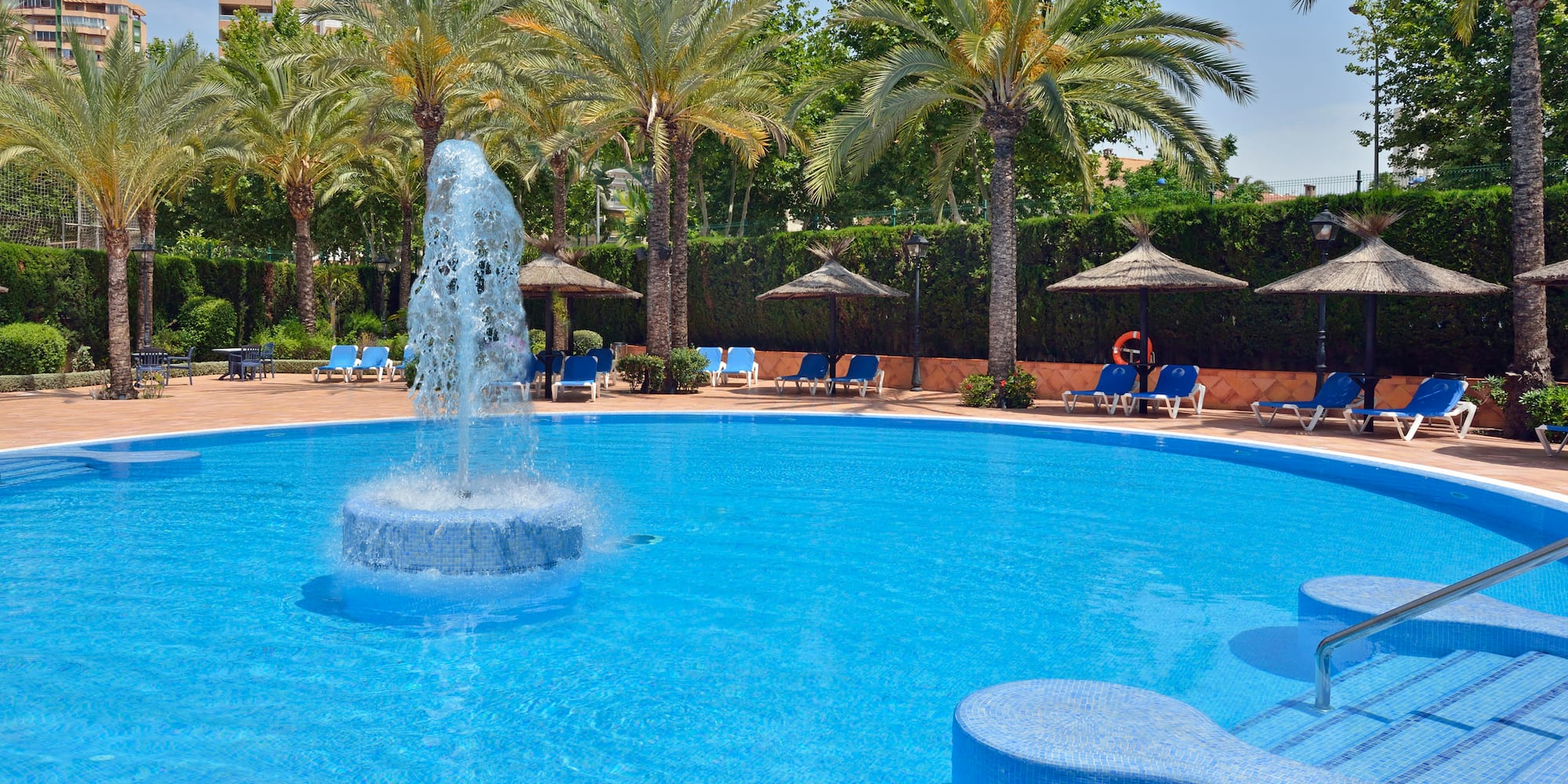 a pool with a fountain in it