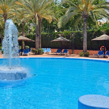 a pool with a fountain in it