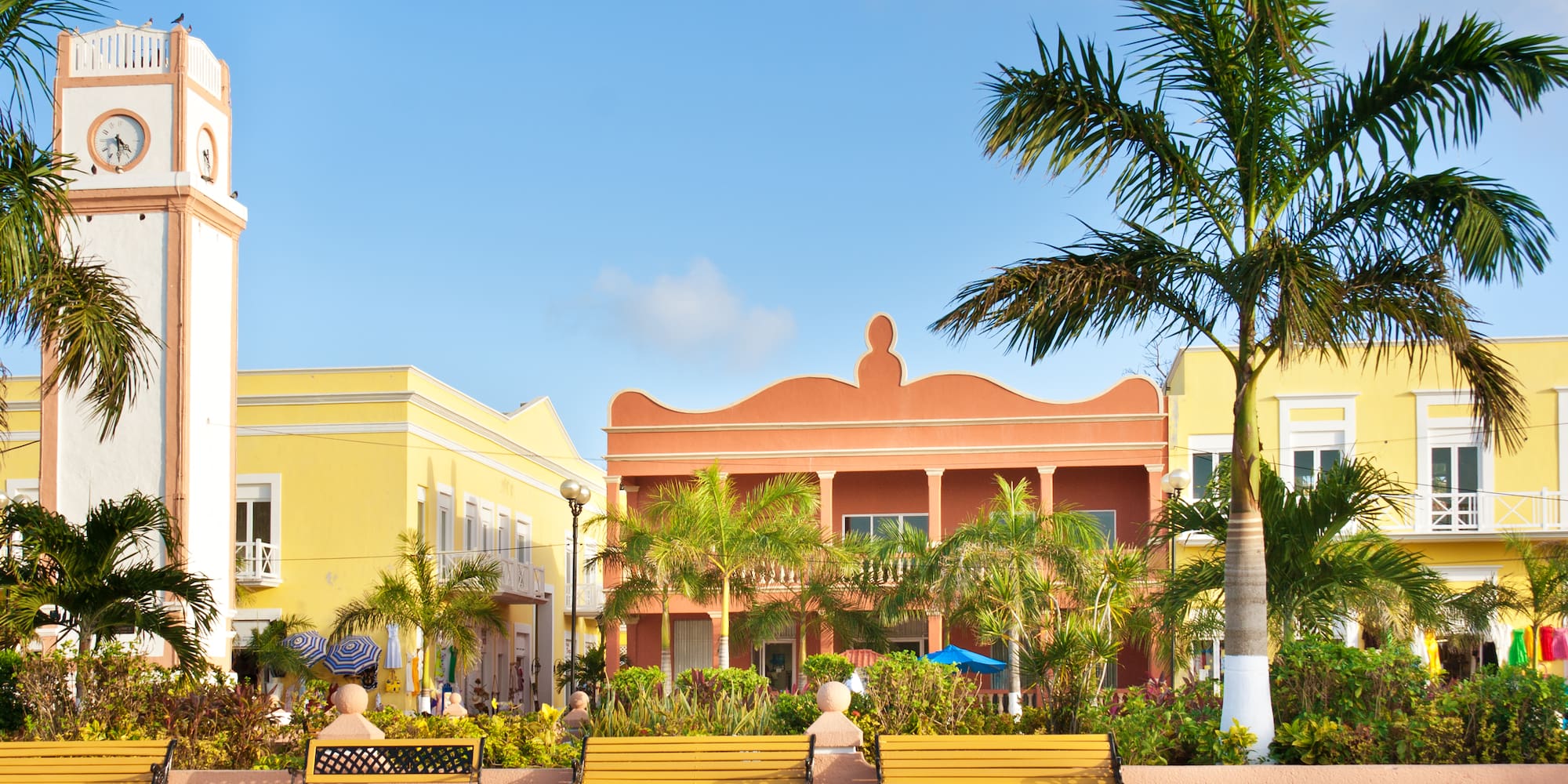a group of benches in front of a building