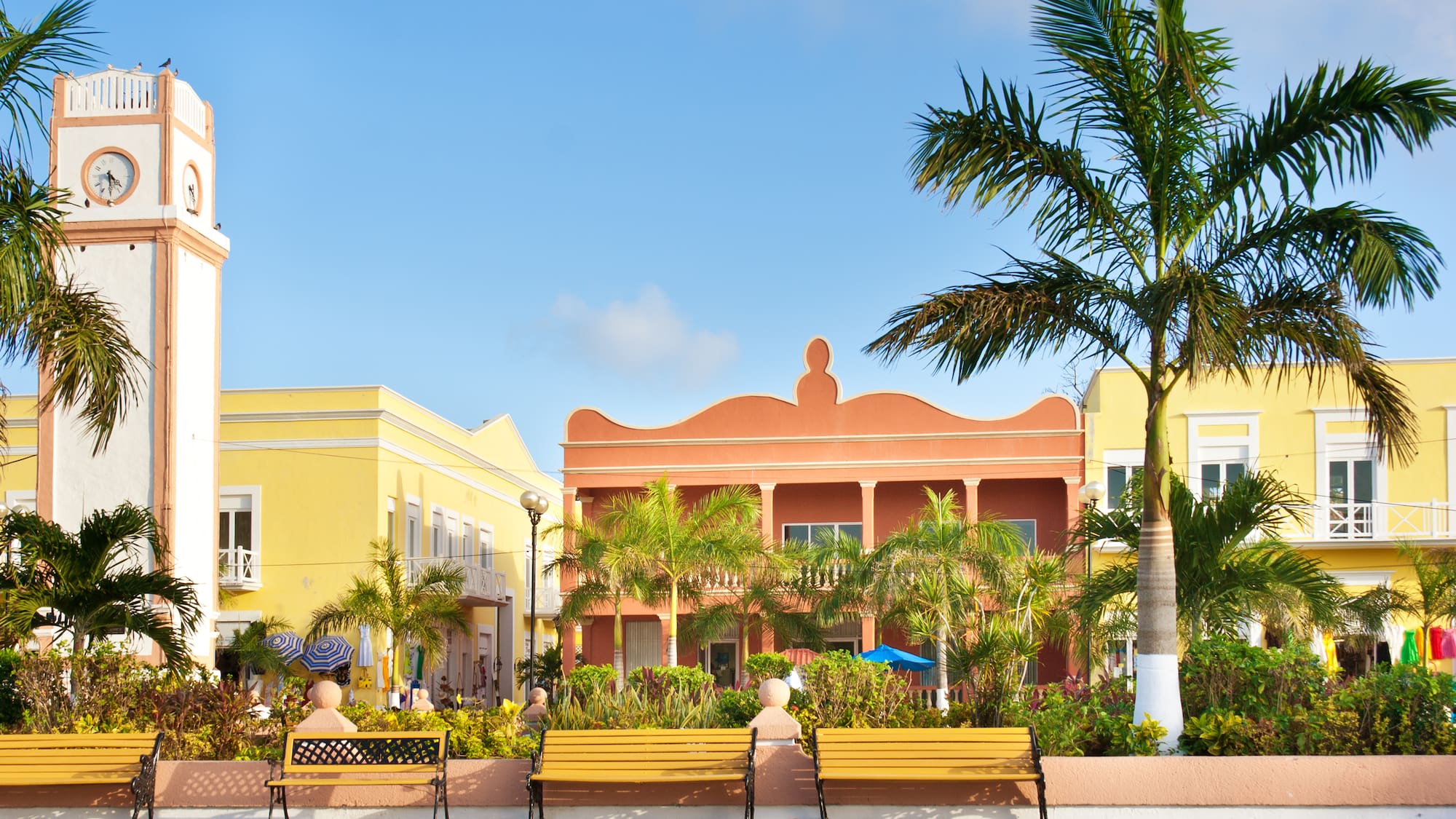 a group of benches in front of a building