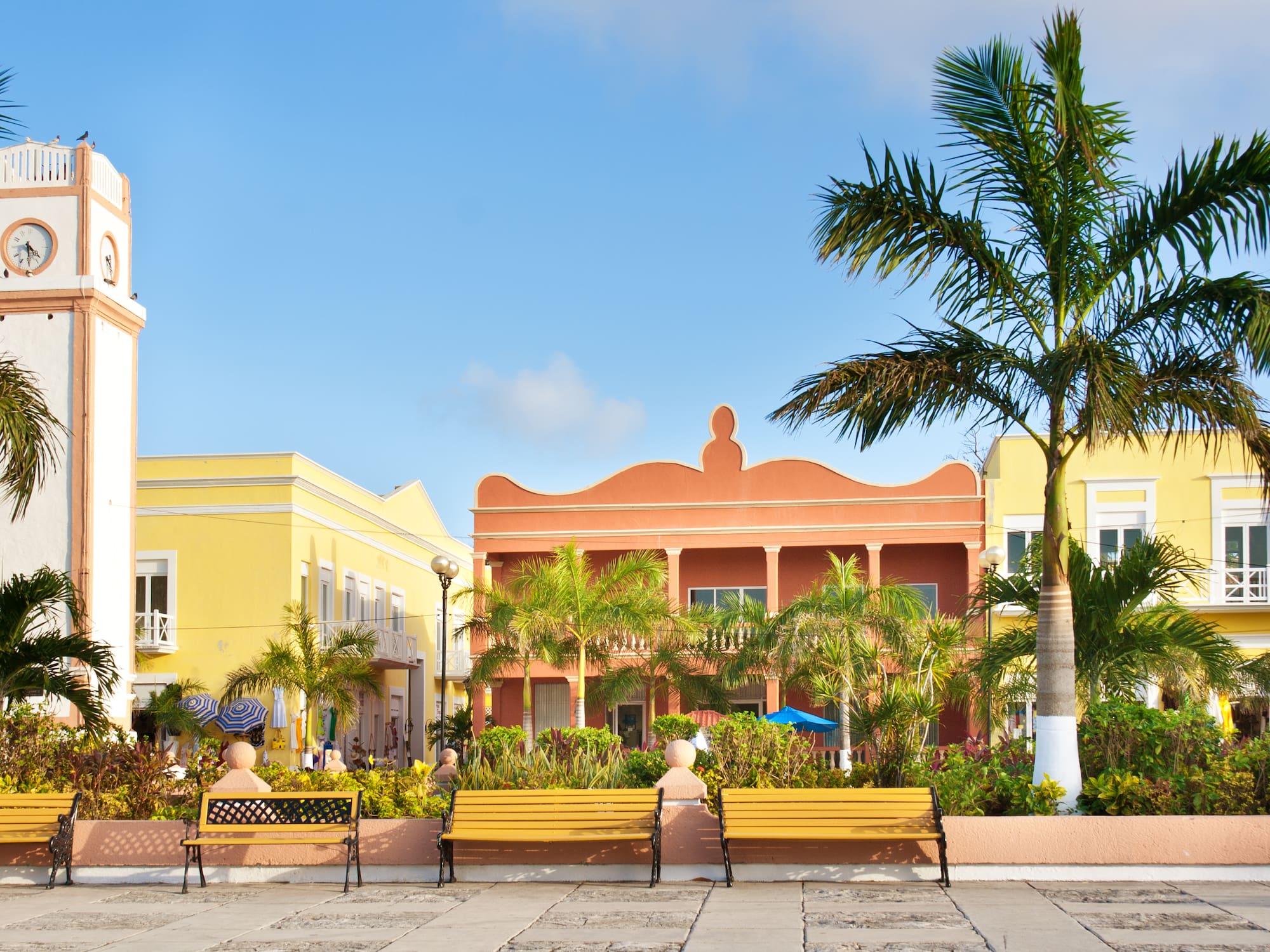 a group of benches in front of a building