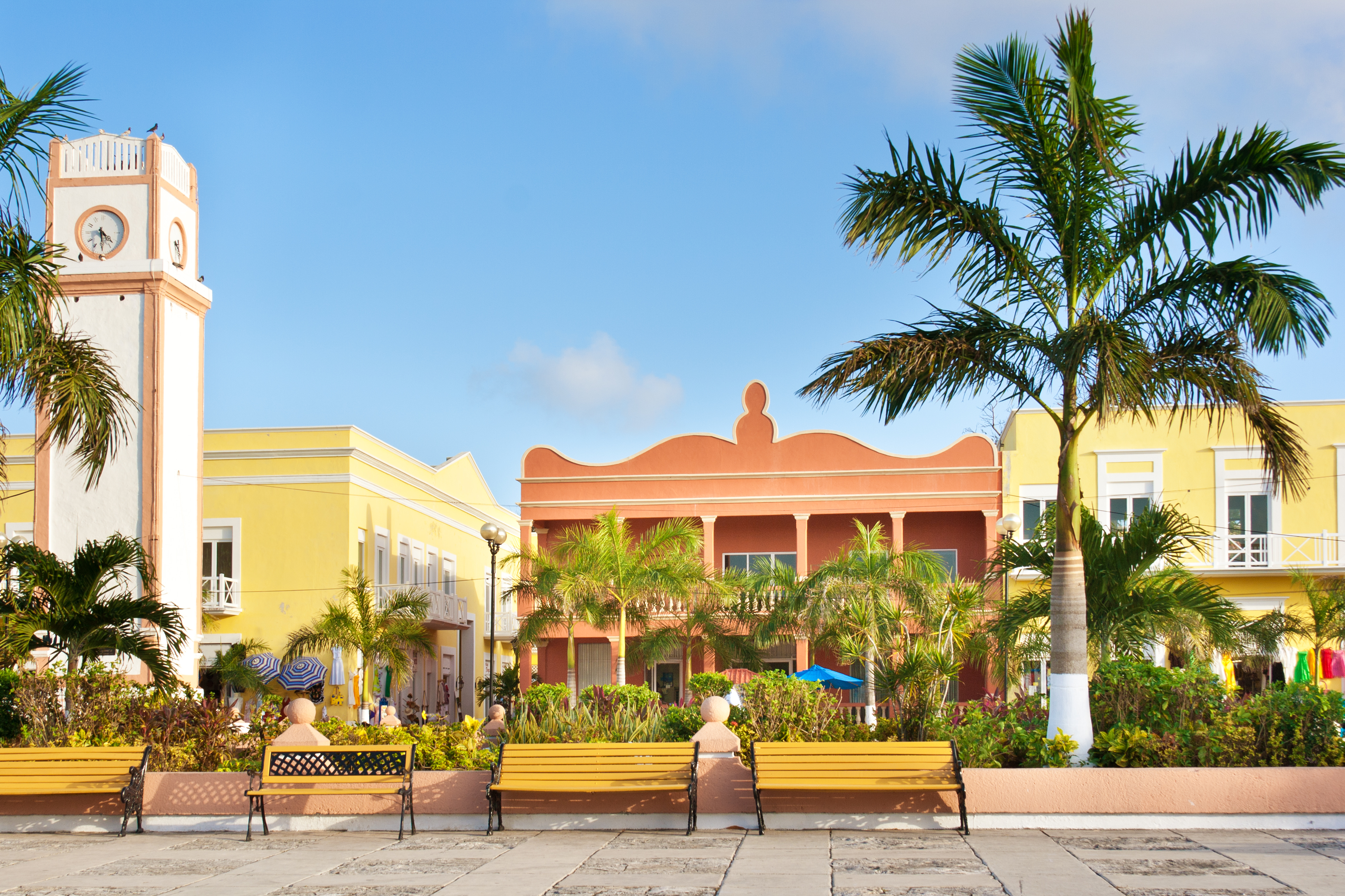 a group of benches in front of a building