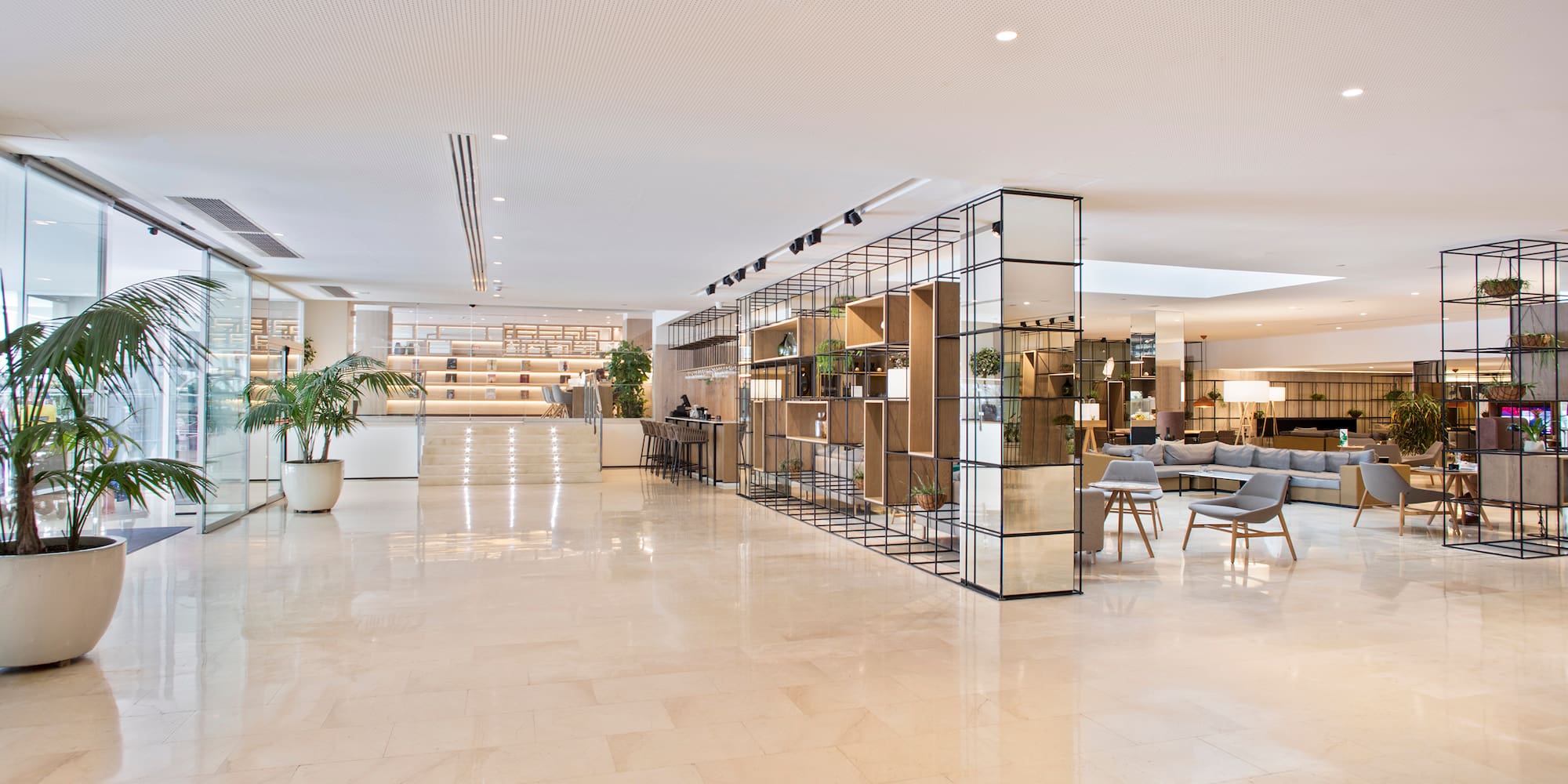 a large white room with a white ceiling and a white wall