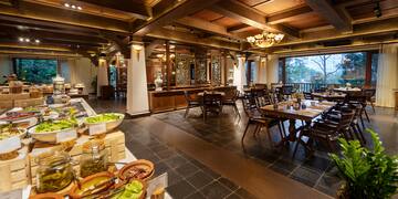 a large room with tables and chairs