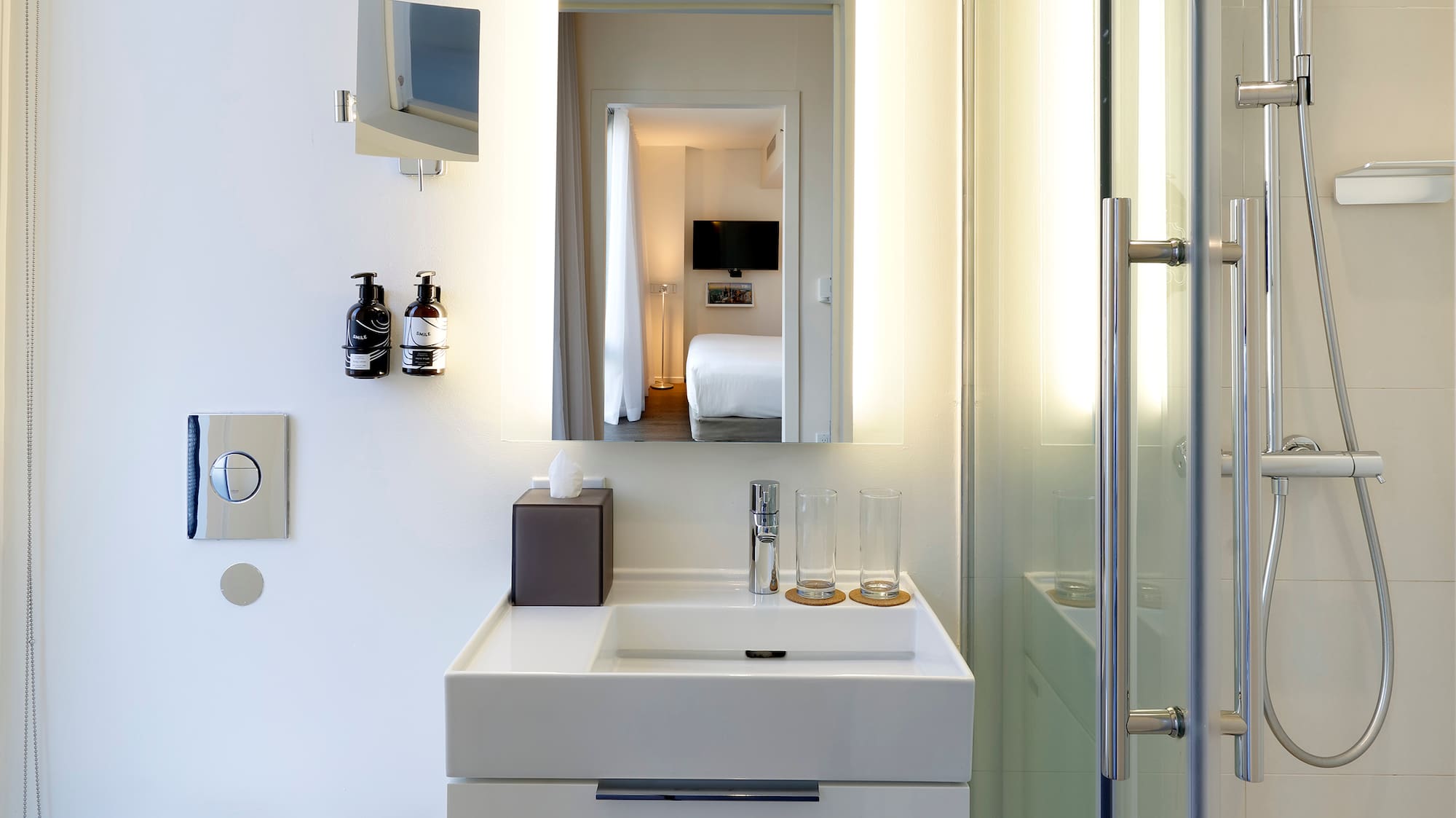 a bathroom with a shower and sink
