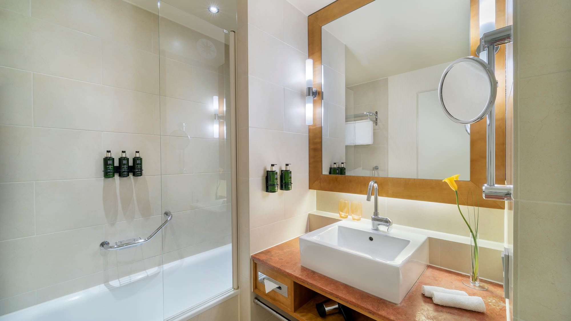 a bathroom with a sink and shower