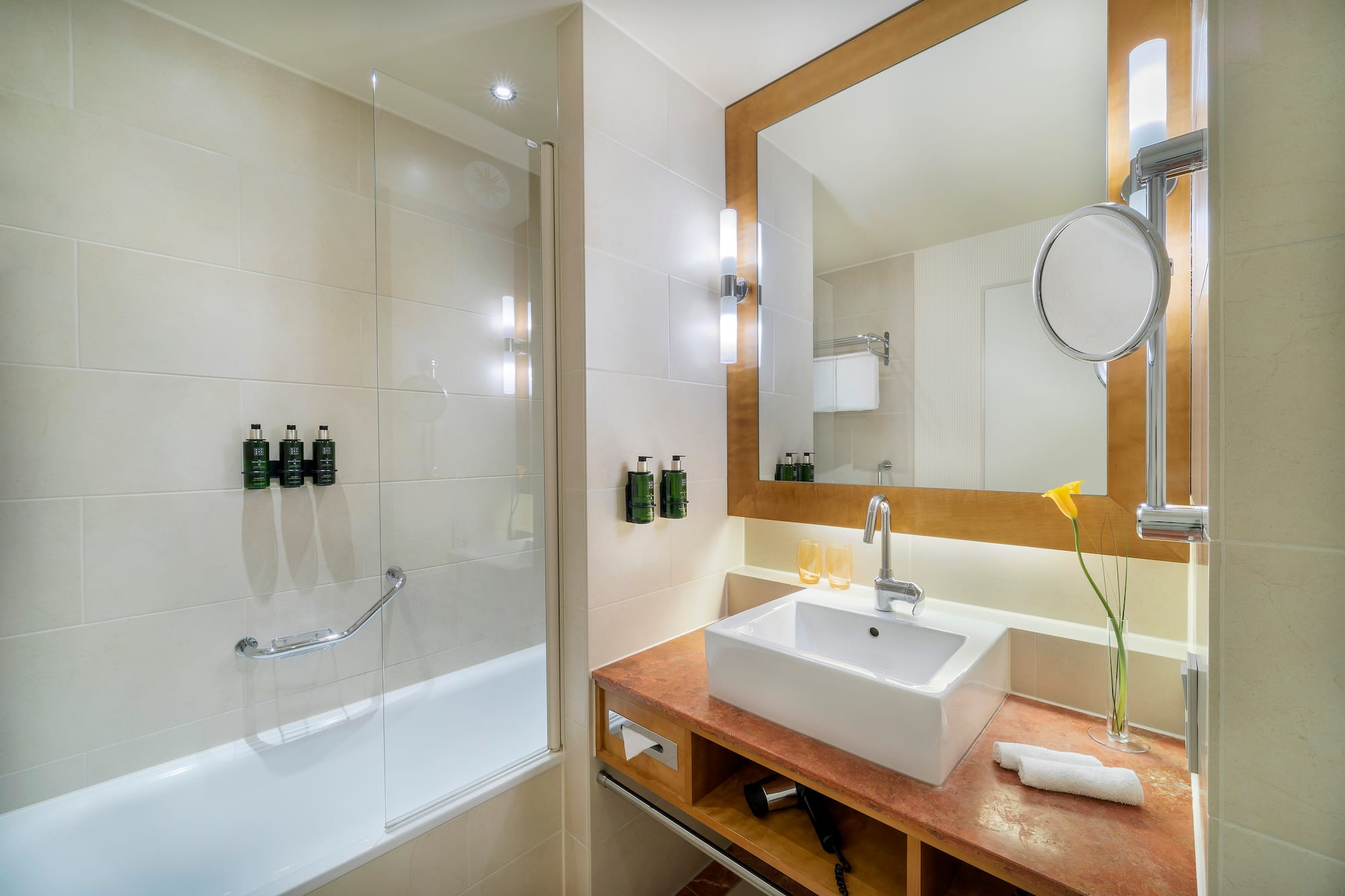 a bathroom with a sink and shower