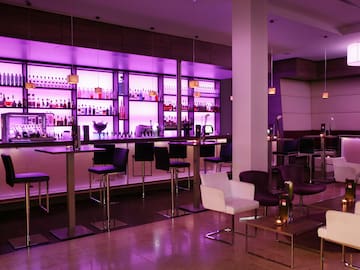 a bar with purple lights
