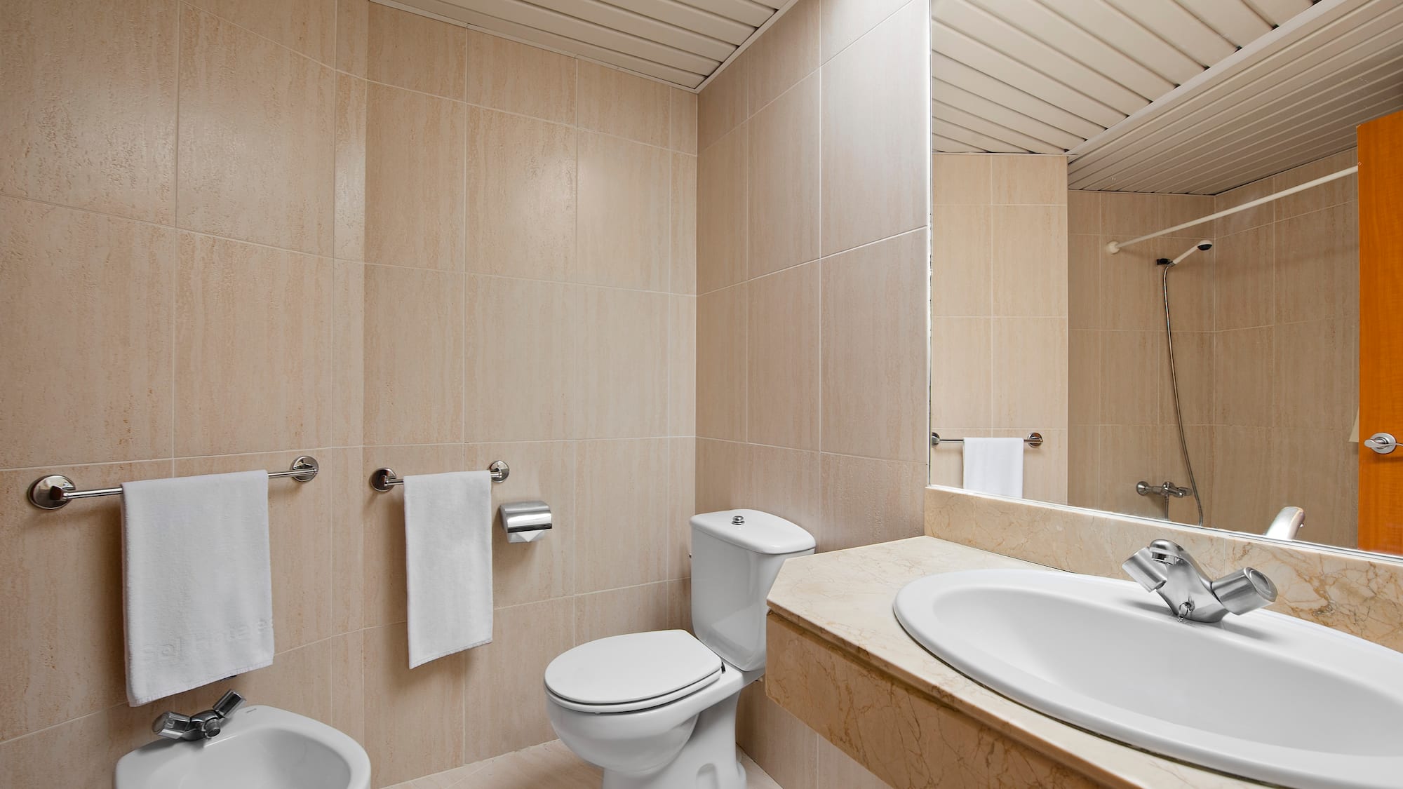 a bathroom with a sink and toilet