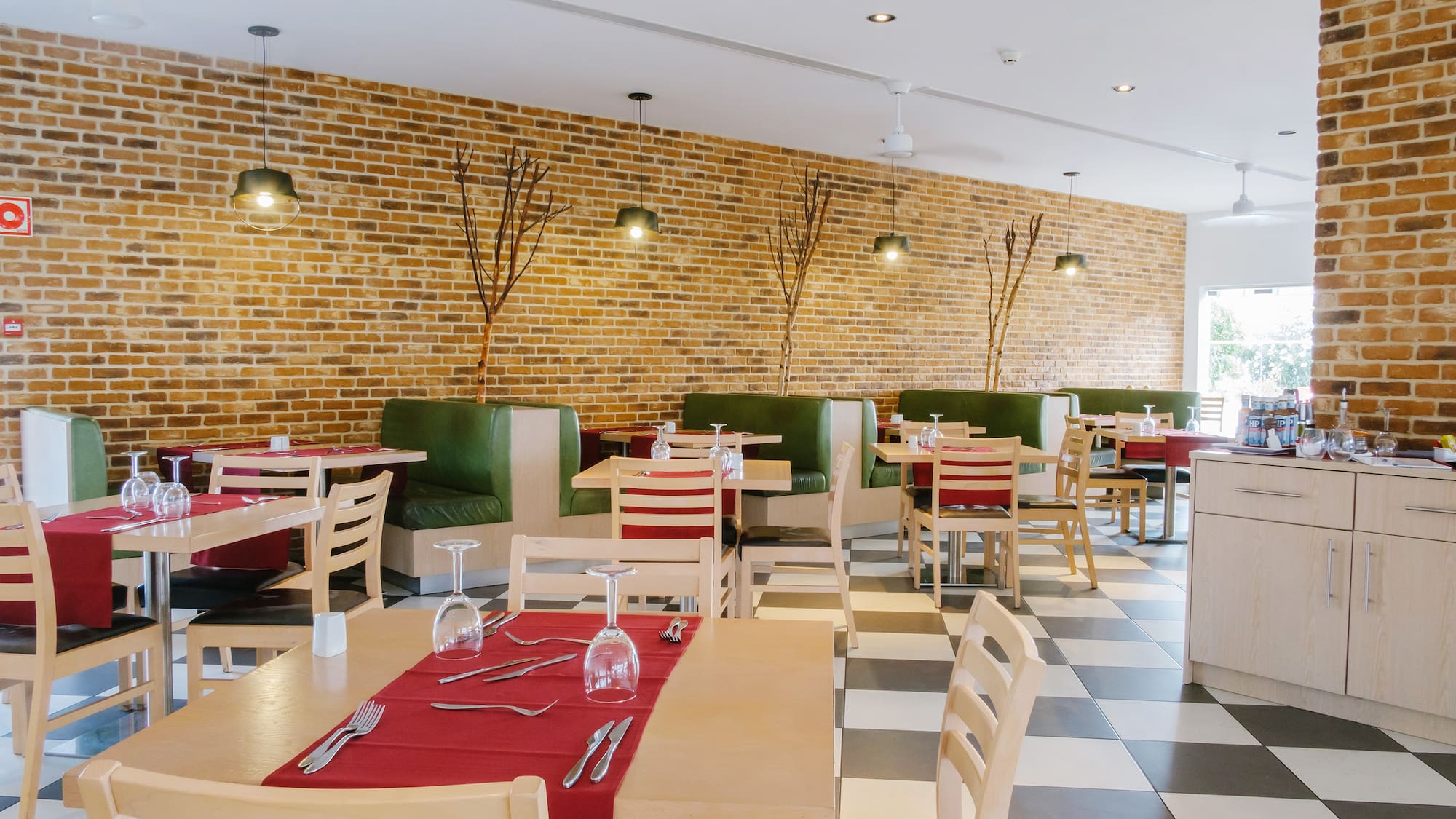 a restaurant with tables and chairs