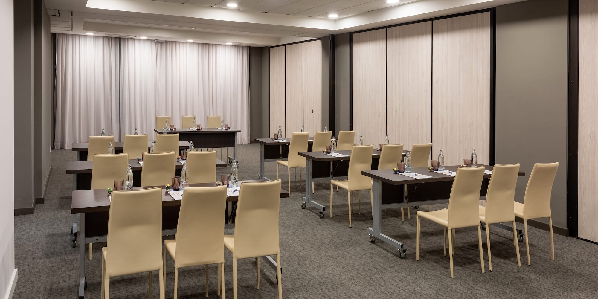 a room with tables and chairs