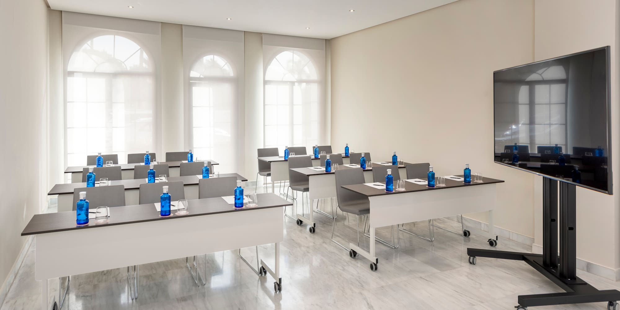 a room with tables and chairs