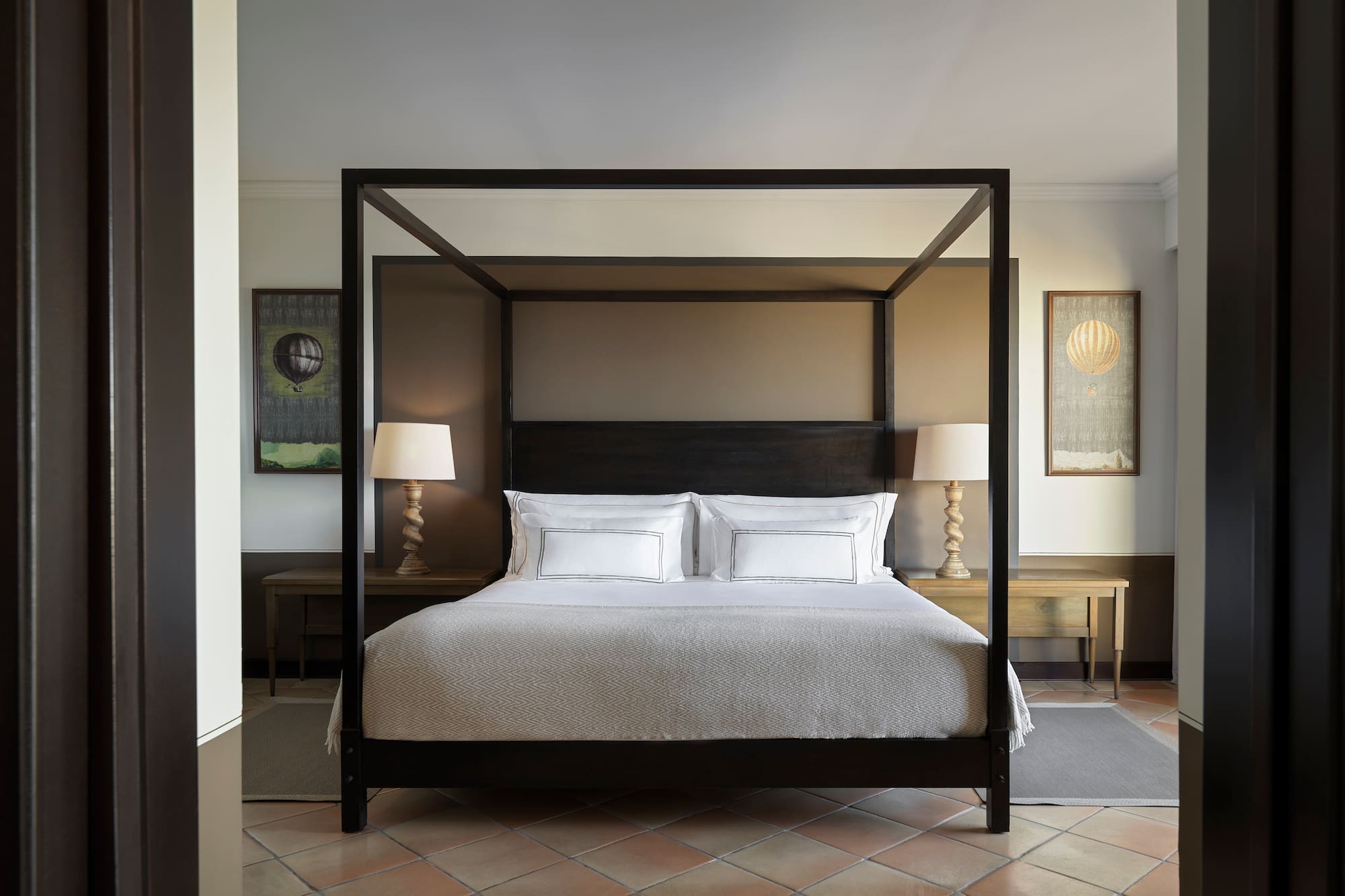 a bed with a canopy in a room