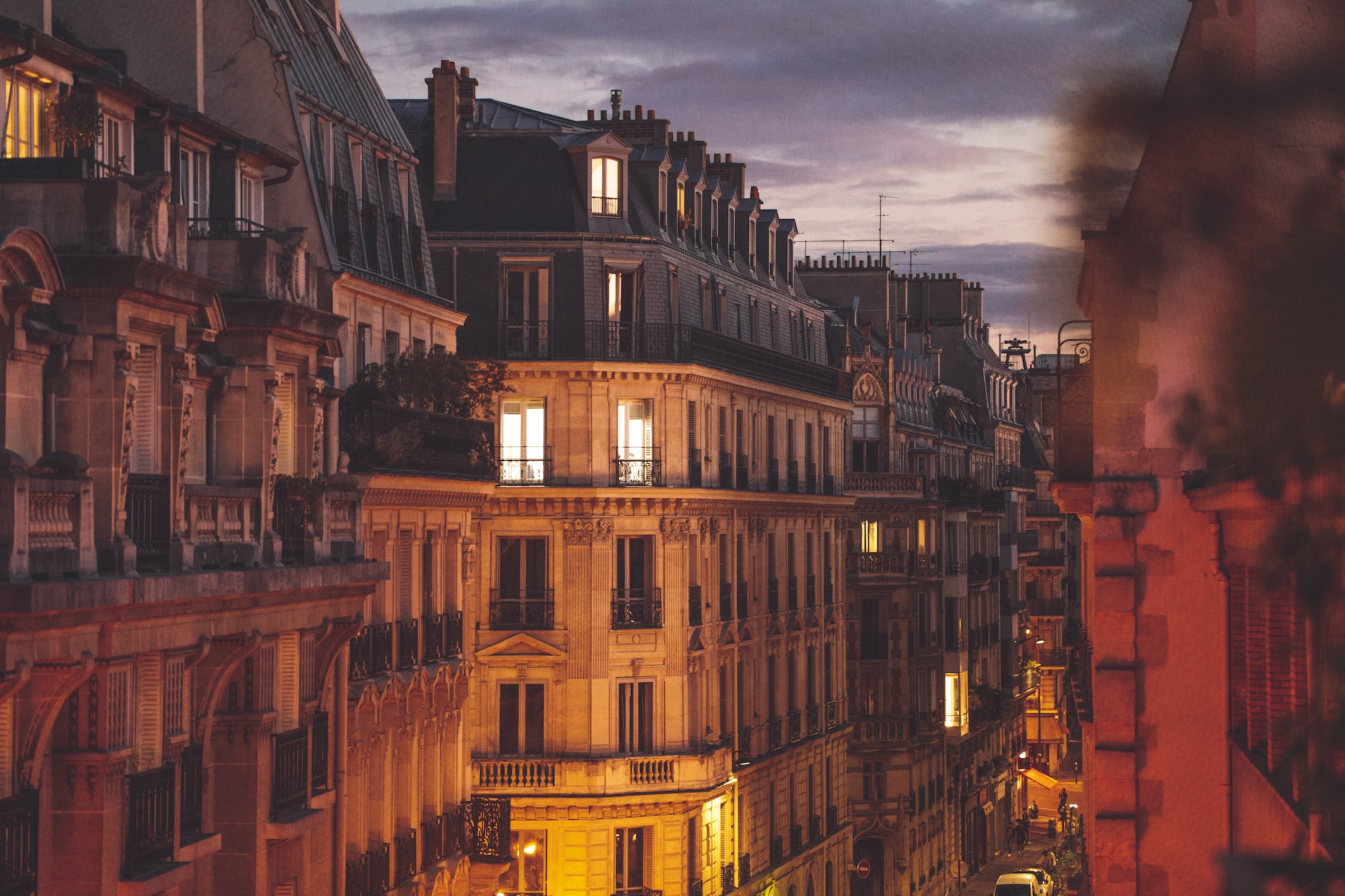 a city street with buildings and a street in the background