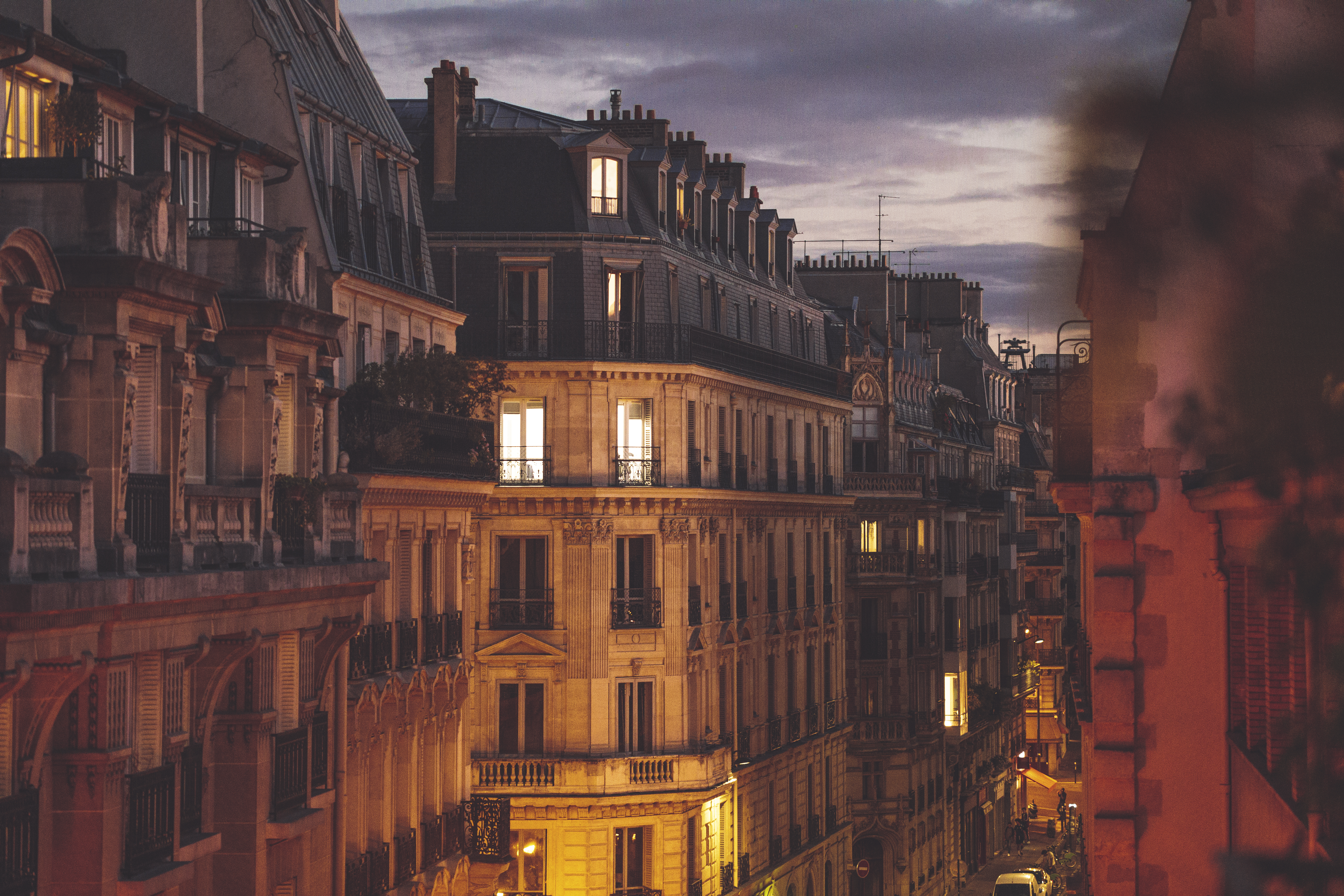 a city street with buildings and a street in the background