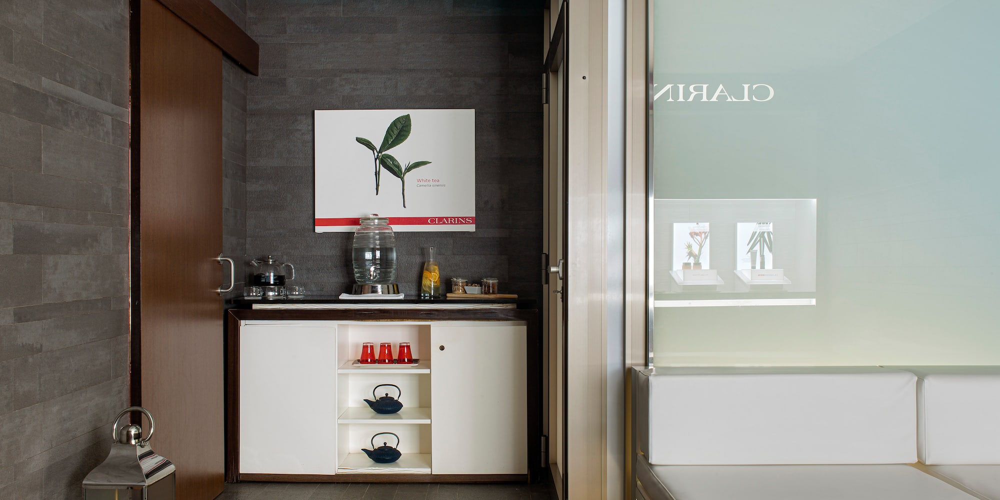 a room with a bed and a bench